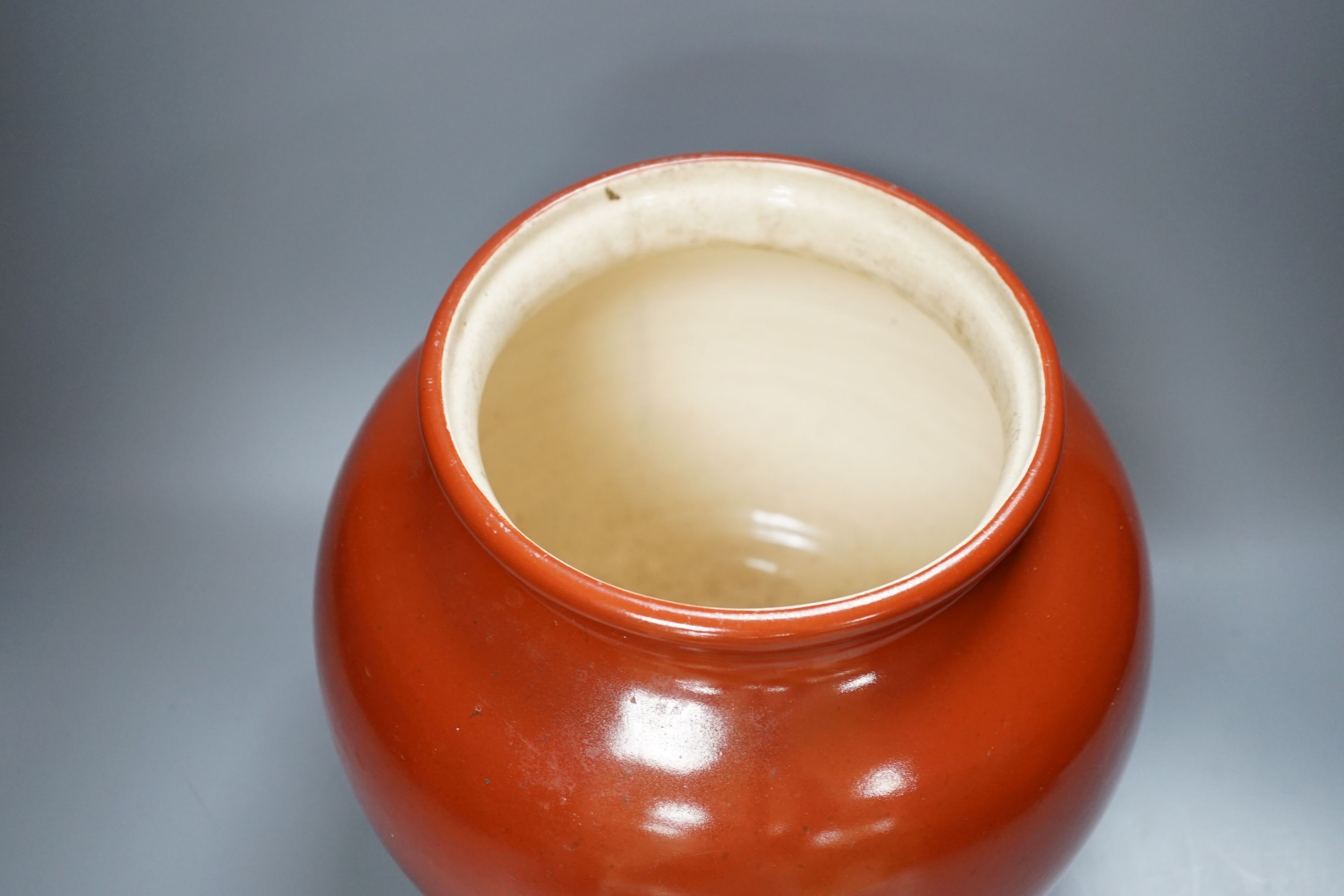 A 19th century Chinese famille rose pot and cover, 15cm diam., together with a decorative Chinese jug and large monochrome china pot